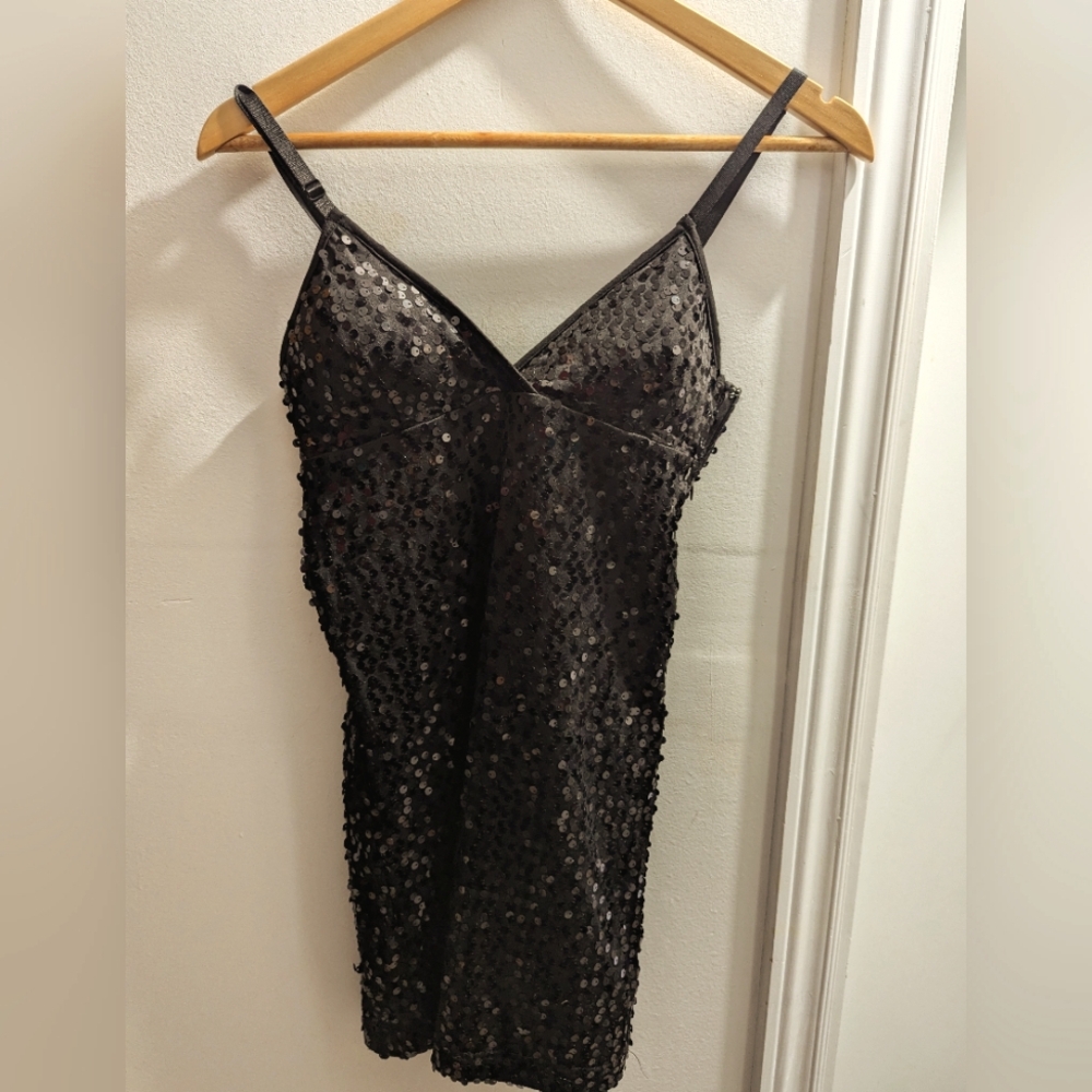 Black sequin bodycon minidress.